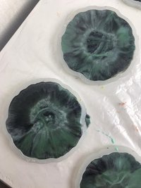 The process of making resin coasters in molds